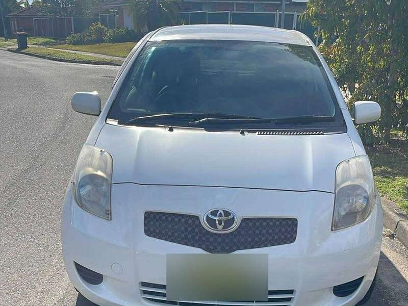 White Toyota Yaris available for weekly car rental in Newcastle